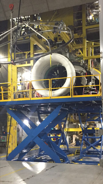 Pratt Lift with airplane part with equipment surrounding